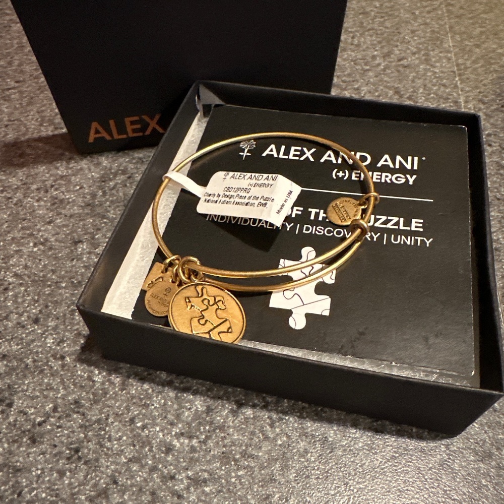 NWT gold, Alex and Ani piece of the puzzle bracelet